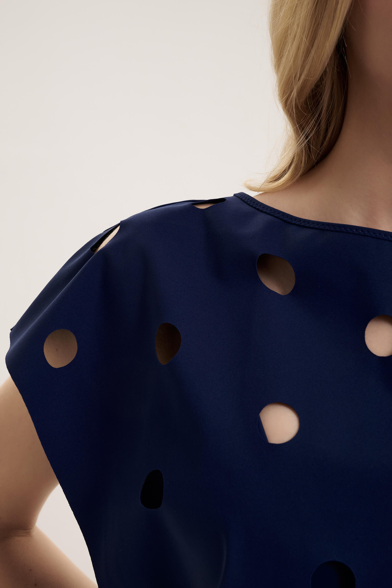 Слитный купальник с перфорацией Shan 